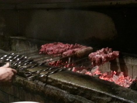 Lamb, Steak Tips, and Housemade Sausage on the Charcoal BBQ Grill at Santarpio's